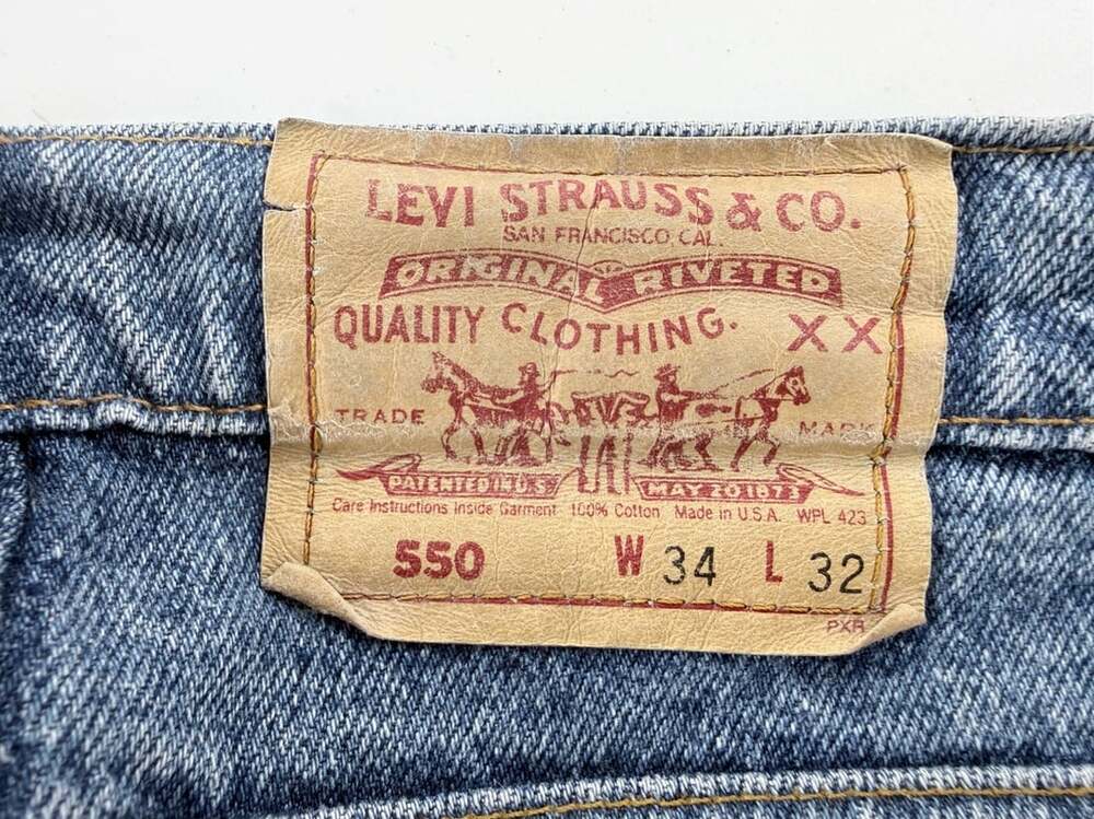 Levi's 550 Relaxed Fit Jeans Size 34x32 Light Wash Blue Denim Made In USA